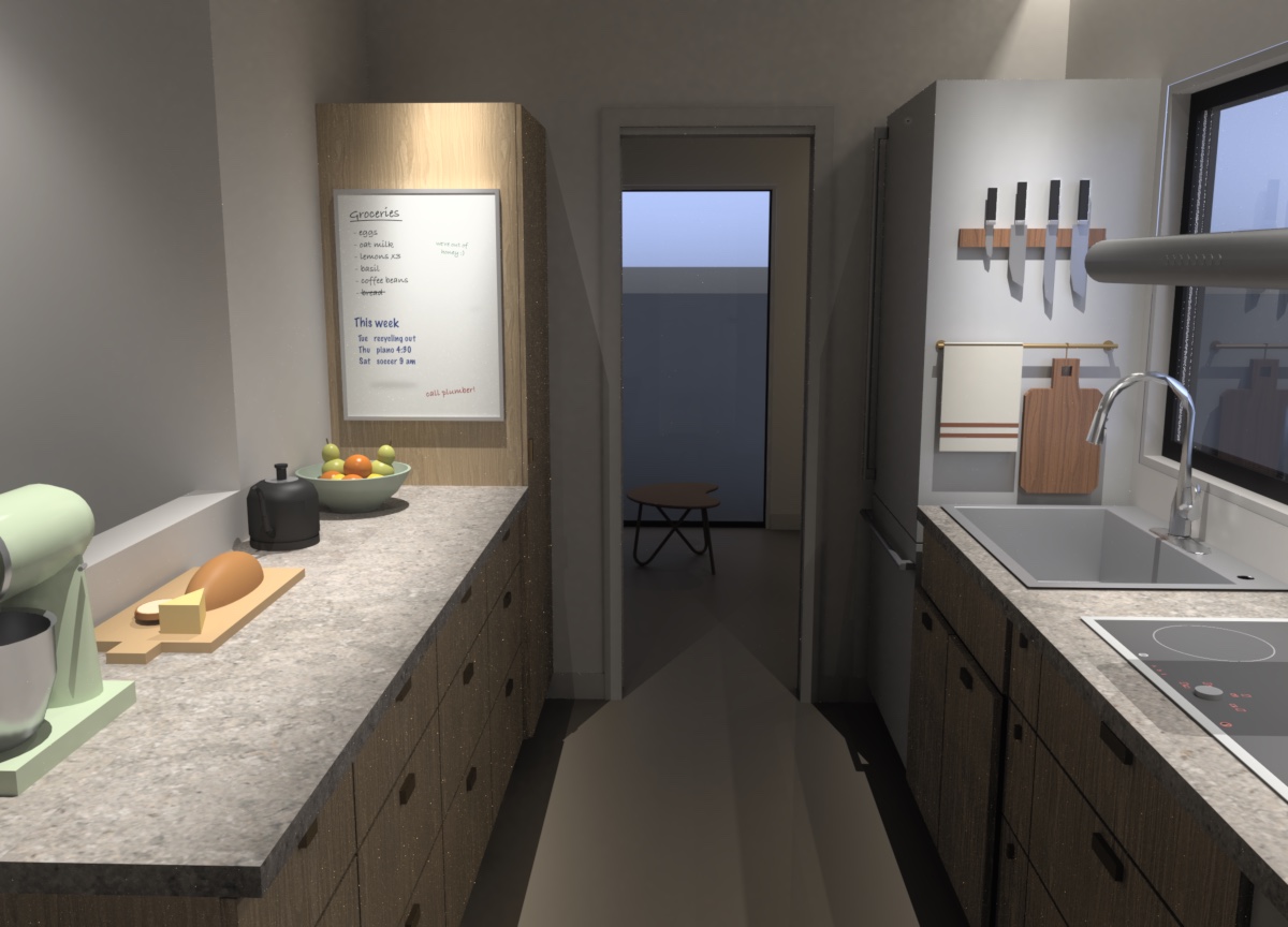 Render looking down the kitchen between its two stone
                counters, both evenly lit from the ceiling, toward a tall
                pantry with a family notes board on its side. A stand mixer,
                bread, a kettle and a bowl of fruit sit on the left counter.